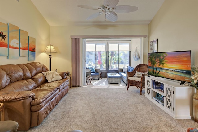 living room with light carpet and ceiling fan