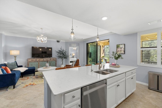 kitchen featuring stainless steel dishwasher, sink, decorative light fixtures, a center island with sink, and white cabinets