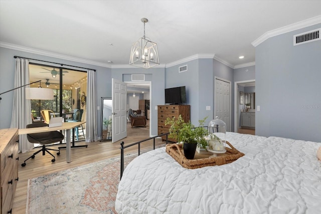 bedroom featuring access to exterior, an inviting chandelier, light wood-type flooring, and ornamental molding