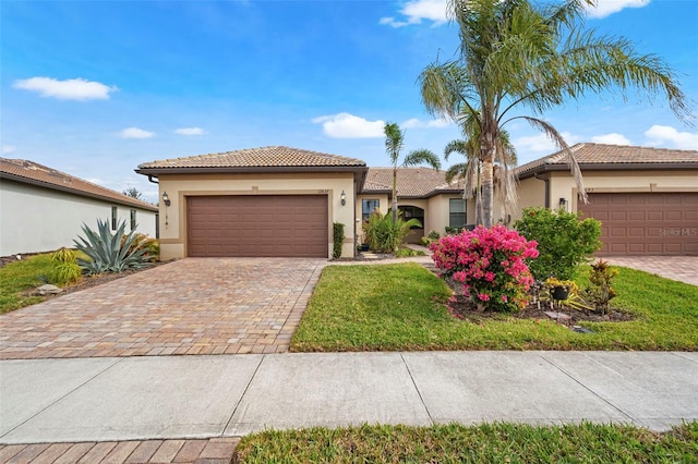 mediterranean / spanish-style house featuring a garage