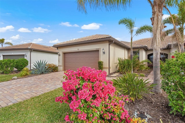 view of front of property with a garage