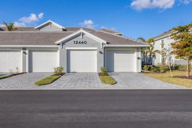 ranch-style home with a garage