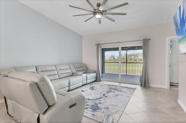 tiled living room featuring ceiling fan