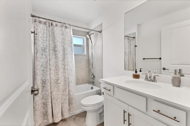 full bathroom featuring tile patterned flooring, vanity, shower / tub combo, and toilet