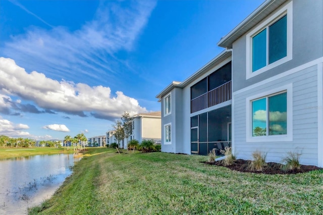 view of yard featuring a water view