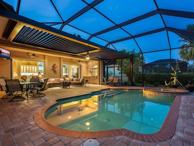 view of swimming pool featuring an in ground hot tub, ceiling fan, a patio, and an outdoor hangout area