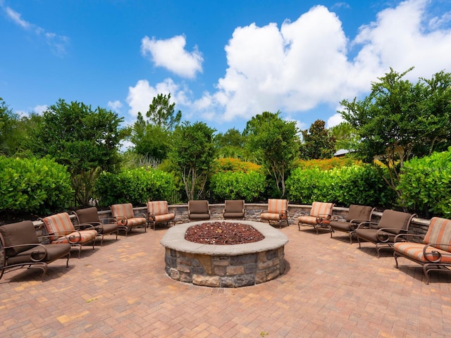 view of patio featuring an outdoor fire pit