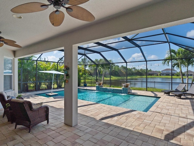 5930 Anise Dr, Sarasota, FL 34238 - outdoor pool featuring a lanai, a water view, a patio, and ceiling fan