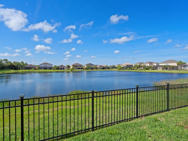 5930 Anise Dr, Sarasota, FL 34238 - view of water feature featuring fence and a residential view
