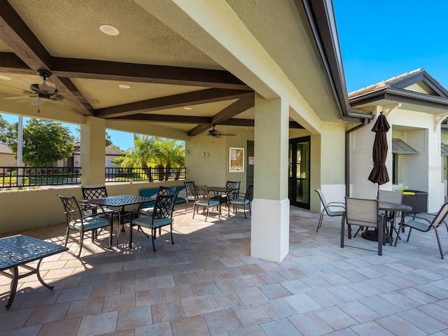 view of patio with ceiling fan