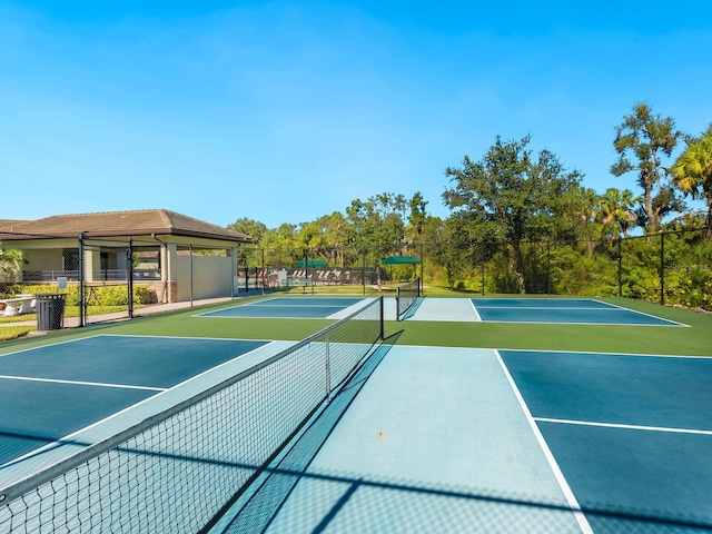 view of sport court featuring basketball hoop