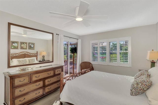 bedroom featuring ceiling fan and light hardwood / wood-style flooring