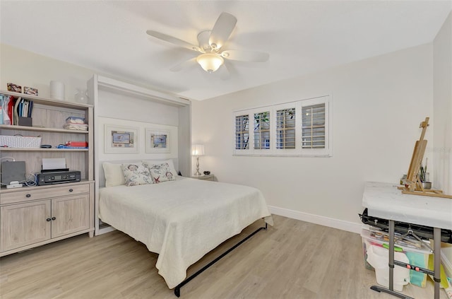 bedroom featuring ceiling fan and light wood-type flooring