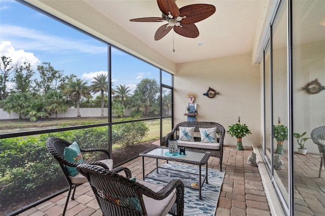 sunroom / solarium with ceiling fan