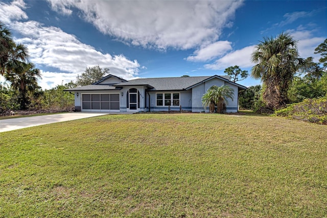 ranch-style home featuring a front yard and a garage