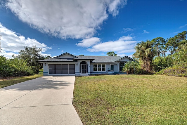 ranch-style house featuring a front yard and a garage