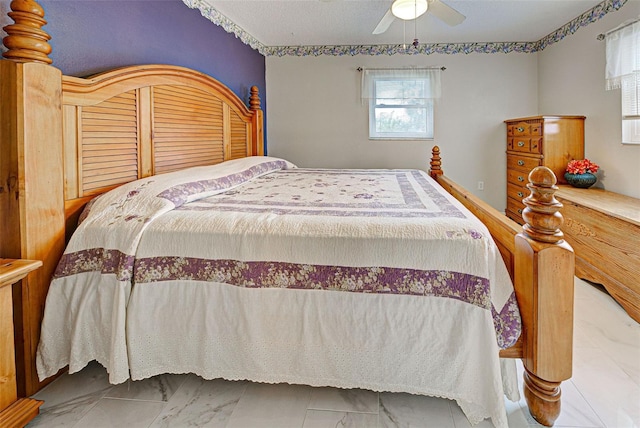 bedroom featuring ceiling fan