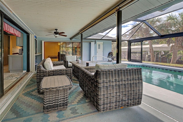 exterior space with ceiling fan and a lanai