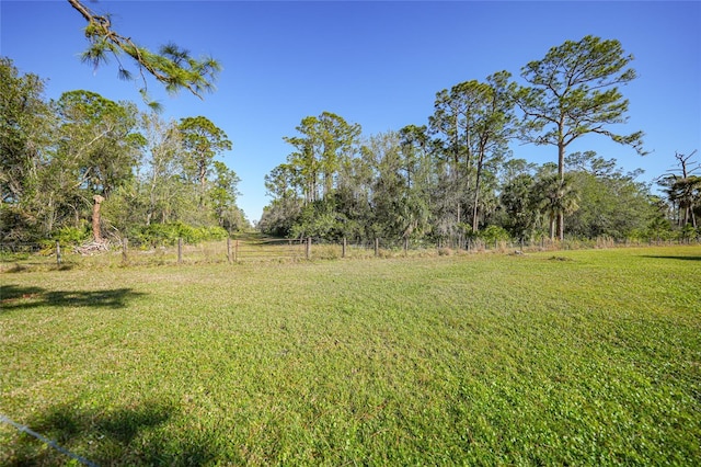 view of yard with fence