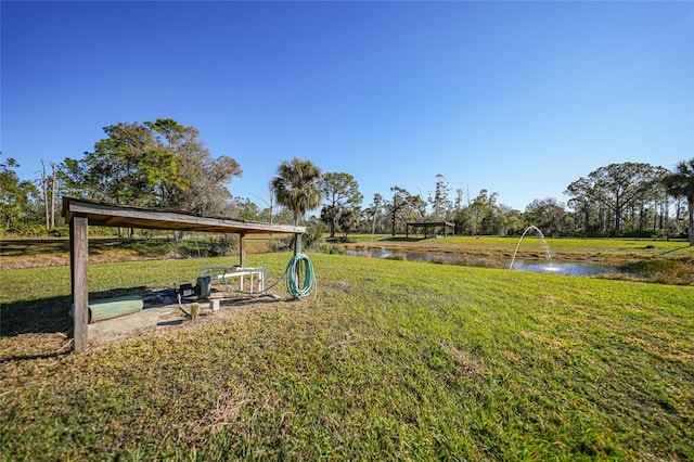 view of yard with a water view