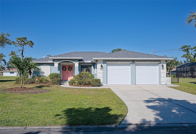 single story home featuring a garage and a front yard