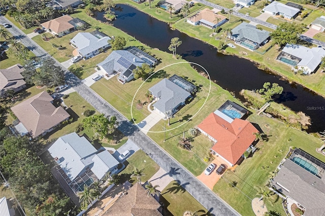 drone / aerial view featuring a water view