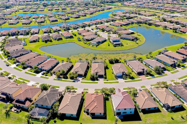 drone / aerial view with a water view