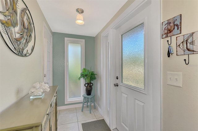 entryway featuring light tile patterned floors