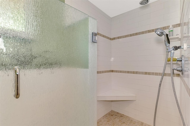 bathroom featuring an enclosed shower