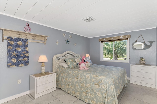 tiled bedroom featuring crown molding