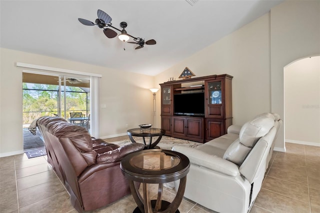 tiled living room with vaulted ceiling and ceiling fan