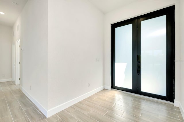 spare room with french doors