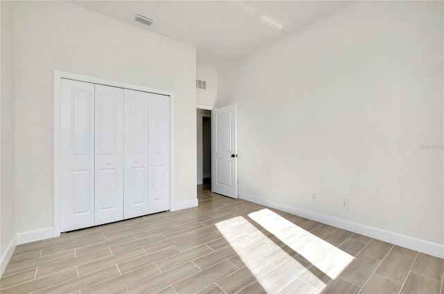 unfurnished bedroom featuring a closet