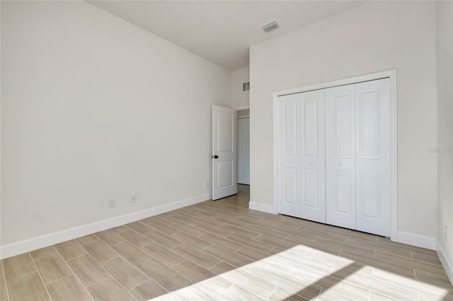 unfurnished bedroom featuring a closet