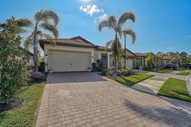 view of front of property with a garage