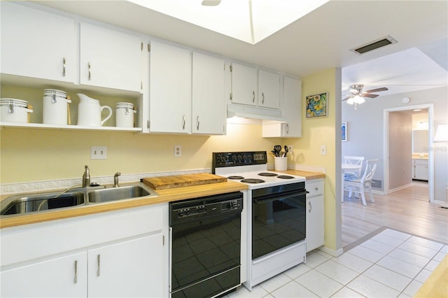 kitchen featuring white cabinetry, sink, black dishwasher, white range with electric stovetop, and light tile patterned flooring