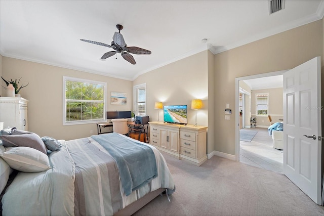 bedroom featuring visible vents, light colored carpet, baseboards, and ornamental molding