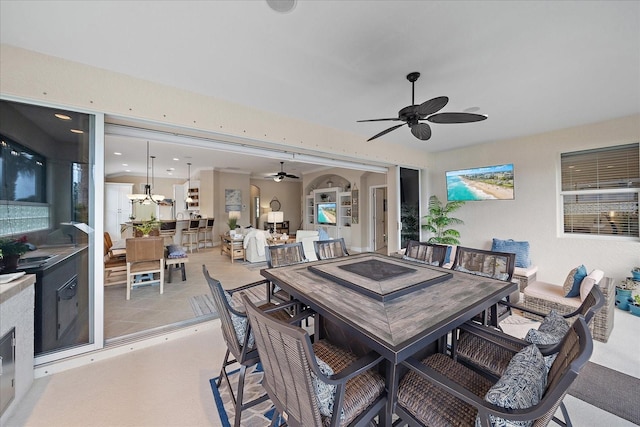 dining space featuring ceiling fan