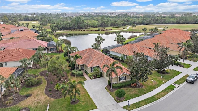 birds eye view of property featuring a water view