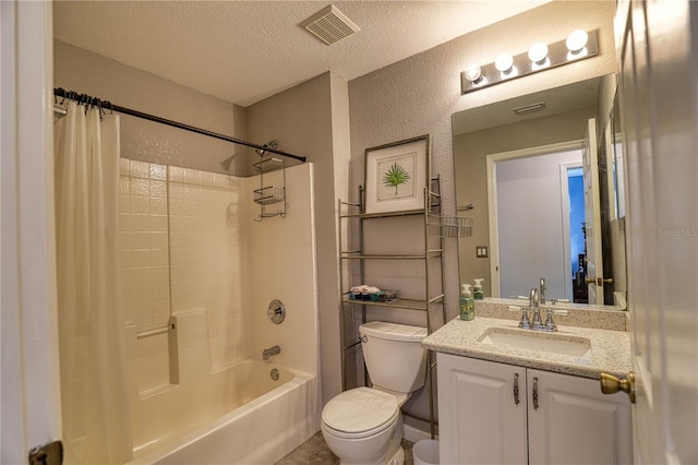 full bathroom with shower / bath combo, toilet, a textured ceiling, and vanity