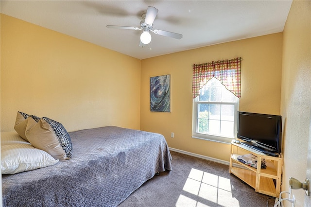 bedroom featuring ceiling fan and carpet floors