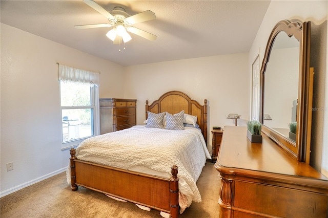 bedroom featuring ceiling fan and carpet floors