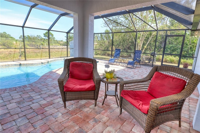 view of patio / terrace with glass enclosure