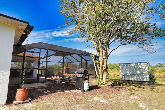 view of yard with a patio area and a lanai