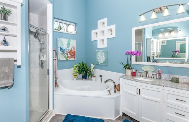 bathroom with vanity and plus walk in shower