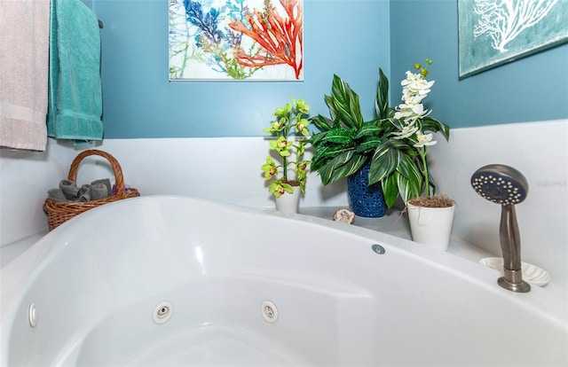 bathroom with a tub to relax in