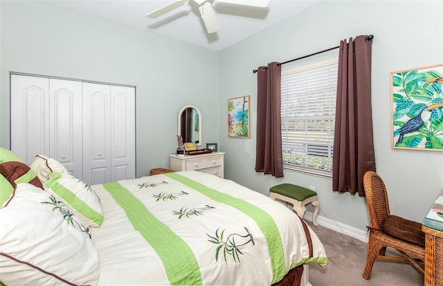 bedroom featuring carpet flooring, ceiling fan, and a closet