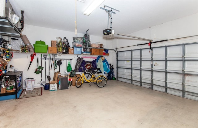 garage featuring a garage door opener