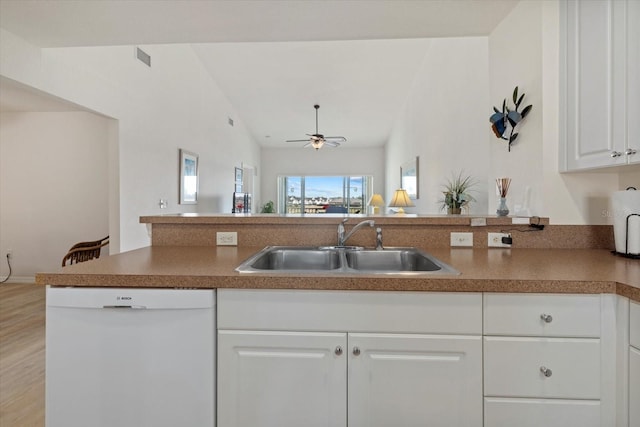 kitchen featuring sink, white cabinetry, dishwasher, ceiling fan, and kitchen peninsula