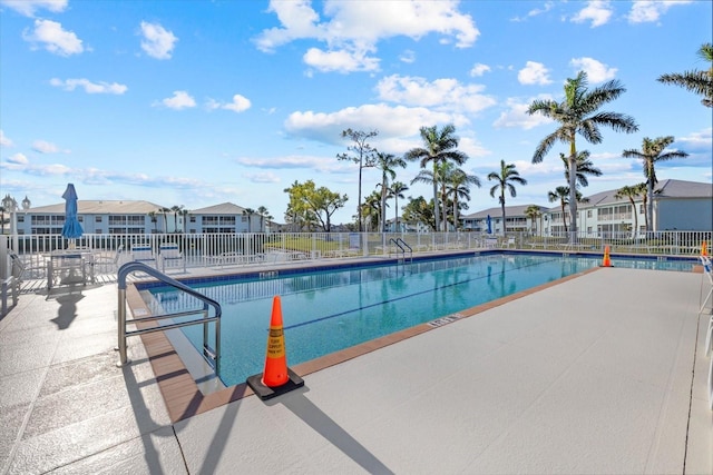 view of pool featuring a patio area